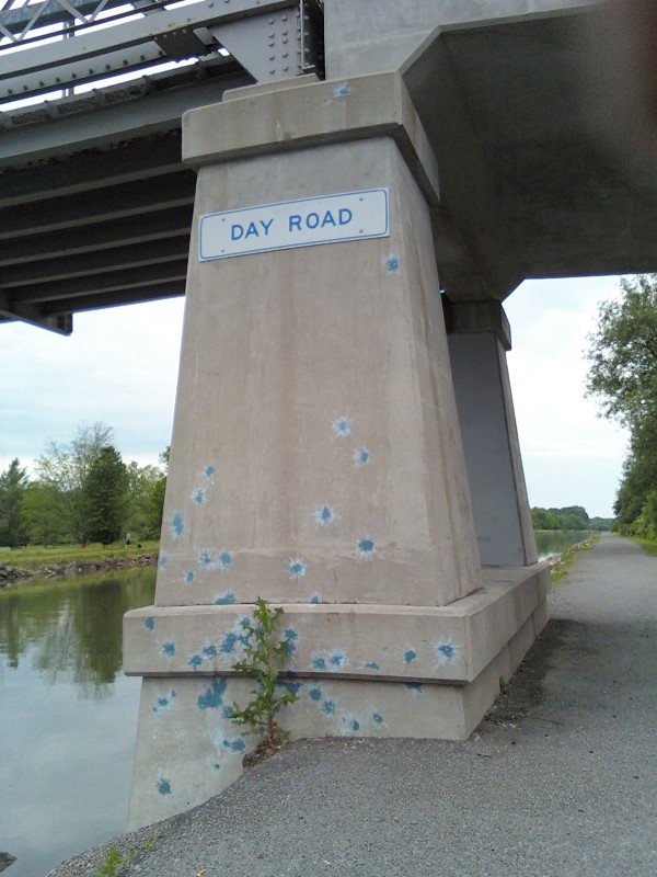Paintball hits mark the Day Road bridge support 